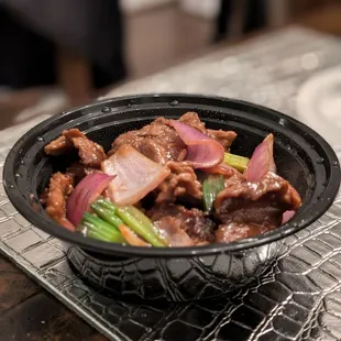 Mongolian beef with scallion and onion