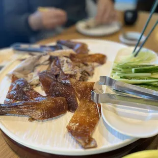 Whole Peking Duck (partly eaten), came w about 15  homemade wraps and scallion/cucumber sliced
