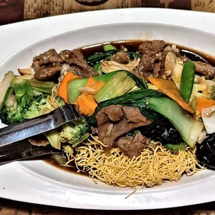 This is the Pan Fried Noodles With Beef entree.  Photo taken December 25, 2021.