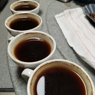 Quality control is key. Here we are at the cupping table.