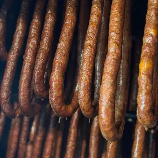 Fresh kielbasa in the smoker makes for a wonderful day.