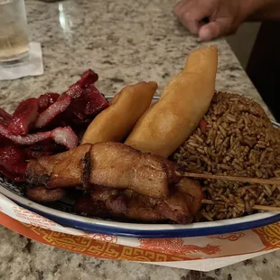 Three-way combination. Boneless spareribs, chicken teriyaki, chicken fingers,  with fried rice.