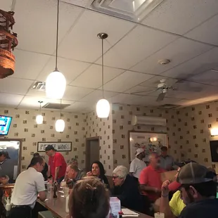 a group of people in a restaurant