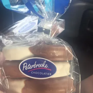 Nutter butters covered in both white &amp; milk chocolate