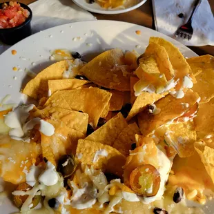 Nice top layer of nachos but the rest was bare.