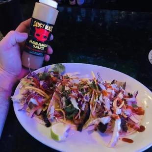 Pork belly tacos with this awesome habanero mango sauce! The Bomb!