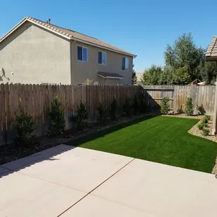 View of turf and landscape from patio