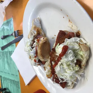 Hot dogs with chili and slaw.