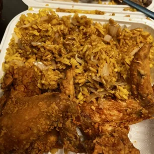 chicken and rice in a styrofoam container