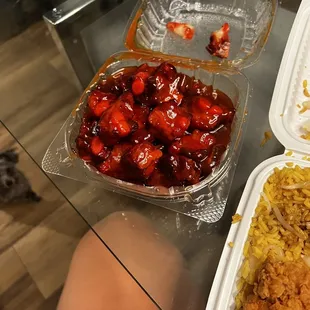 a tray of strawberries and rice