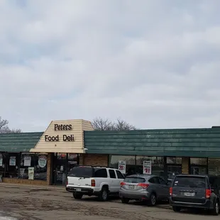 cars parked in front of the store