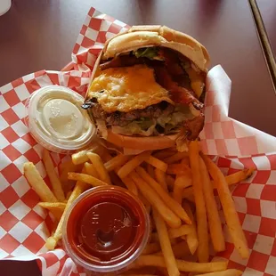 ABC burger with egg and fries.