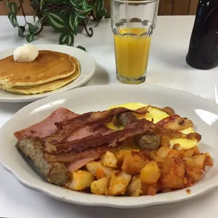 #1 - house special - 2 pancakes, 2 eggs any style + bacon + sausage + ham &amp; homefries