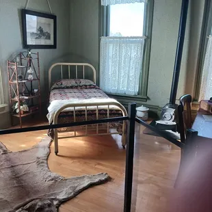 They rented rooms to teachers at the Normal School. That rug is an original but super creepy.