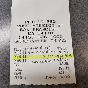 Receipt. I bought 4 pcs pork ribs, 1 small mac salad, 1 plastic bag. I was charged extra $3.50