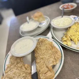Fried Pork Chops biscuit, Biscuit and Gravy scrambled 2 Eggs and Grits