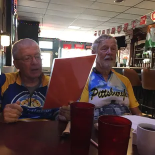 two men sitting at a table