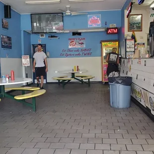 a man standing at a counter