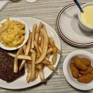 Hamburger Steak ordered without grilled onions. Cup of potato soup ordered on the side. (one of the Monday specials, Dec 2024)