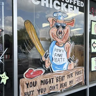 a pig holding a baseball bat