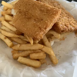 Store bought fried fish rectangles
 And shitty fries