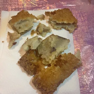 a piece of fried fish and chips