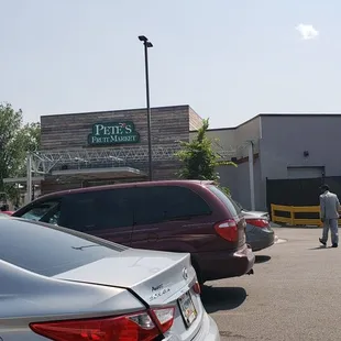 a man standing in a parking lot