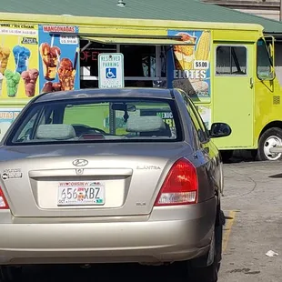 a food truck in the background