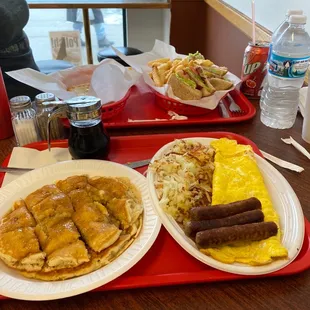 Pancakes and Cheese Omelette, Sausage Links and Hash Browns. BLT Sandwich with French Fries.