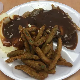 Hamburger steak and fried green beans.