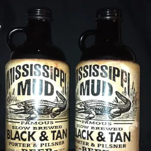two black and tan growlers