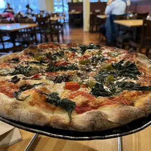 Roasted peppers, roasted mushrooms, spinach pizza.