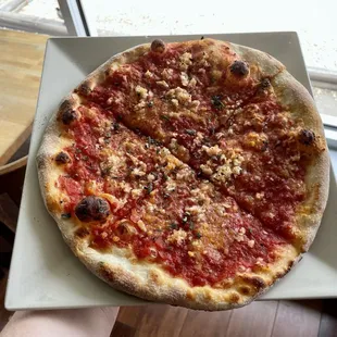 &quot;Tomato Pie&quot; (tomato sauce, pecorino cheese, olive oil, garlic, oregano)