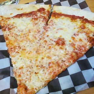 Large slice of pizza for 6 bucks