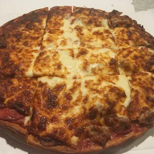 1/2 sausage, 1/2 pepperoni, extra cheese, well done