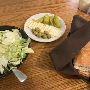 Complimentary salad, bread and cheese plate