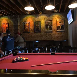 a pool table in a bar