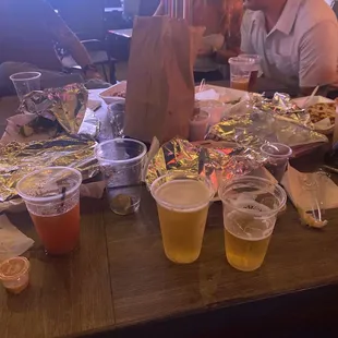 a table full of food and drinks
