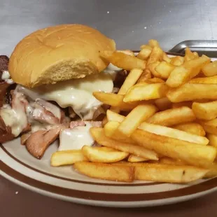 a plate of fries and a sandwich