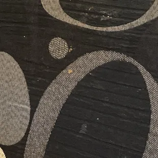 a closeup of a table cloth with circles on it