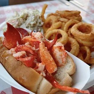 Connecticut style lobster roll combo with cole slaw and onion rings