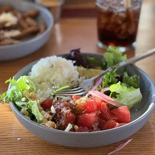 a bowl of salad and rice