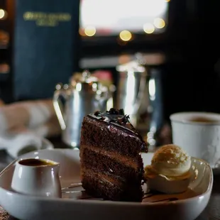 a slice of chocolate cake and ice cream