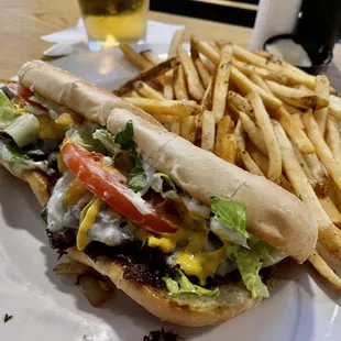 Steak &amp; cheese sub with fries