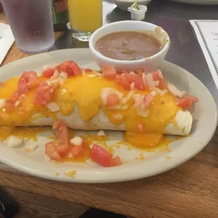 Breakfast burrito supreme with Green Chili on the side.