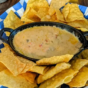 Great smokey queso dip! I could eat it with a spoon by it&apos;s self.