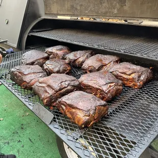 a grill full of ribs