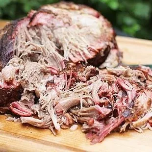 pulled pork on a cutting board
