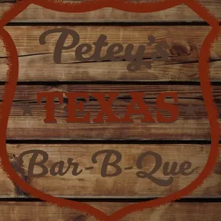 a sign for petey&apos;s texas bar b que