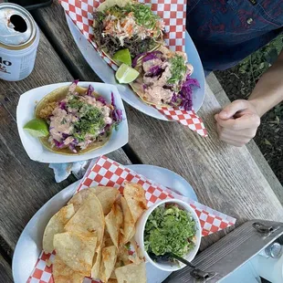 Two fish tacos, Ceviche Plate with chips, and a beef taco